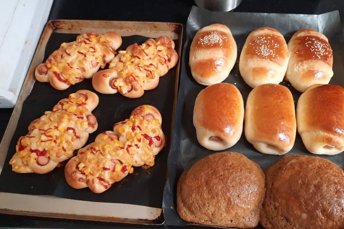 Image of buns coming out of the oven.