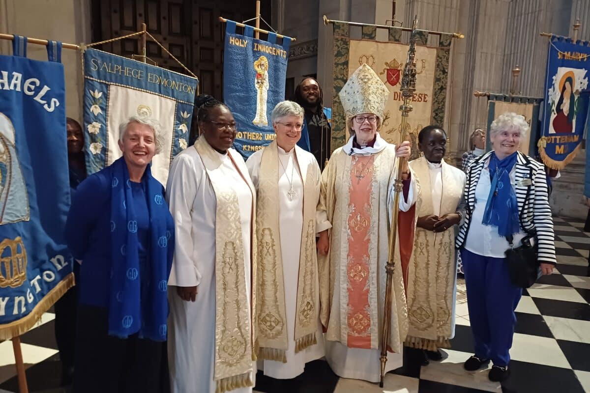 Group of seven women standing in St Paul's Cathedral, including Bishop Sarah and Bishop Emma